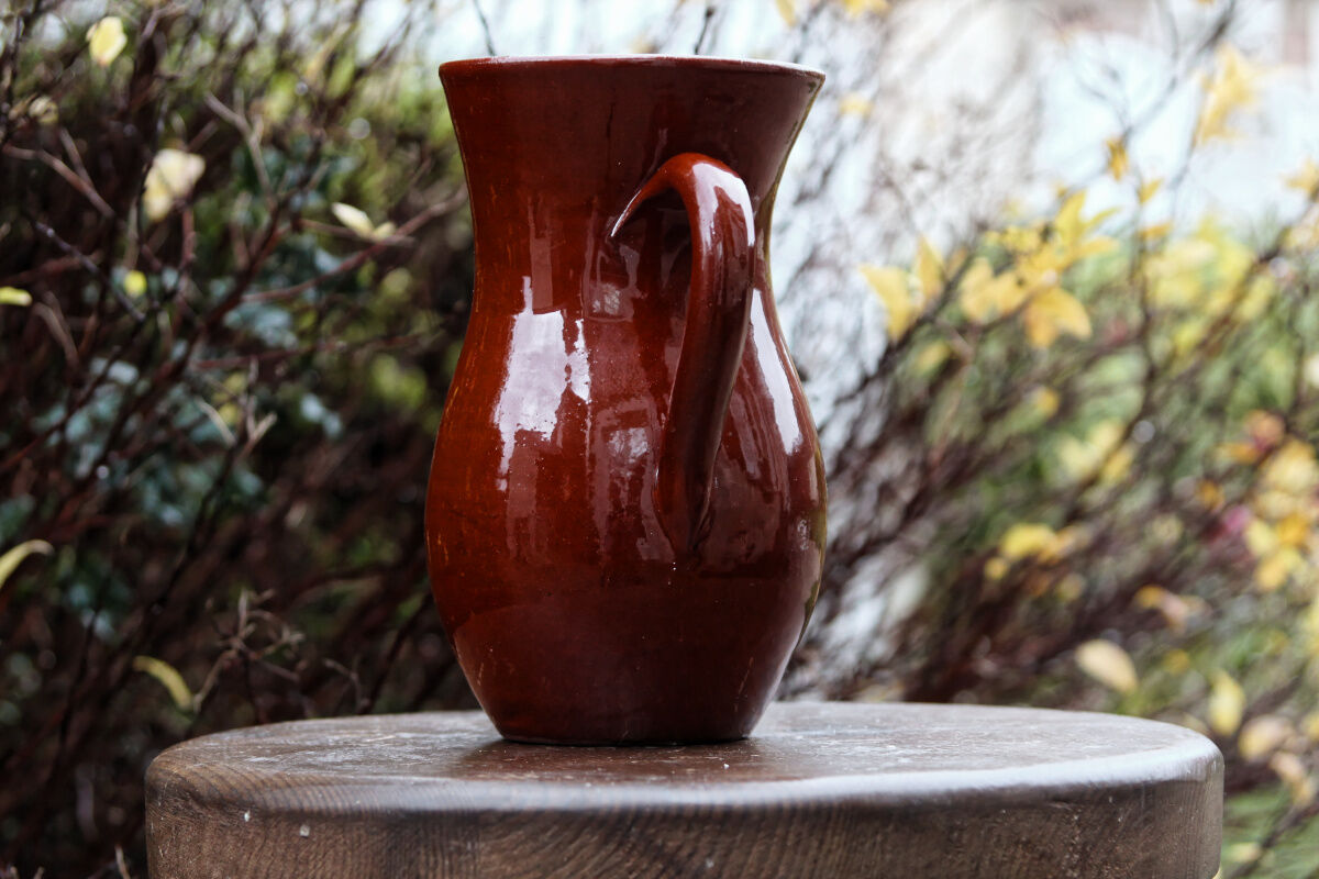 Terracotta pitcher, rust colour
