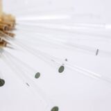 Radiant glass tube chandelier. Contemporary design.