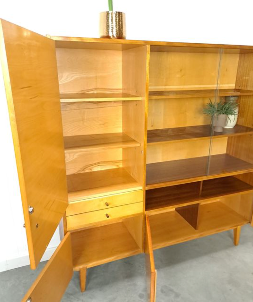 Vintage wooden sideboard with sliding glass doors and drawers