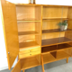 Vintage wooden sideboard with sliding glass doors and drawers
