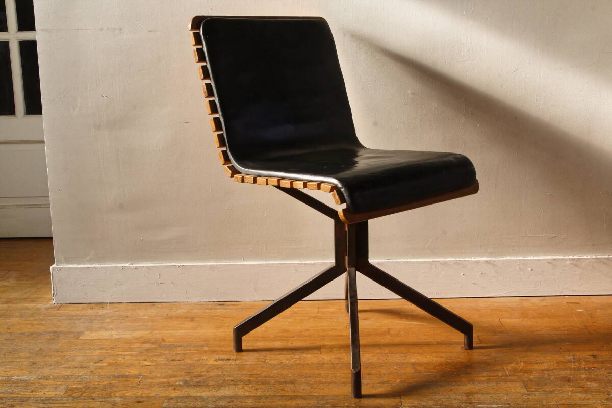 Handcrafted chair, laminated wood and leather