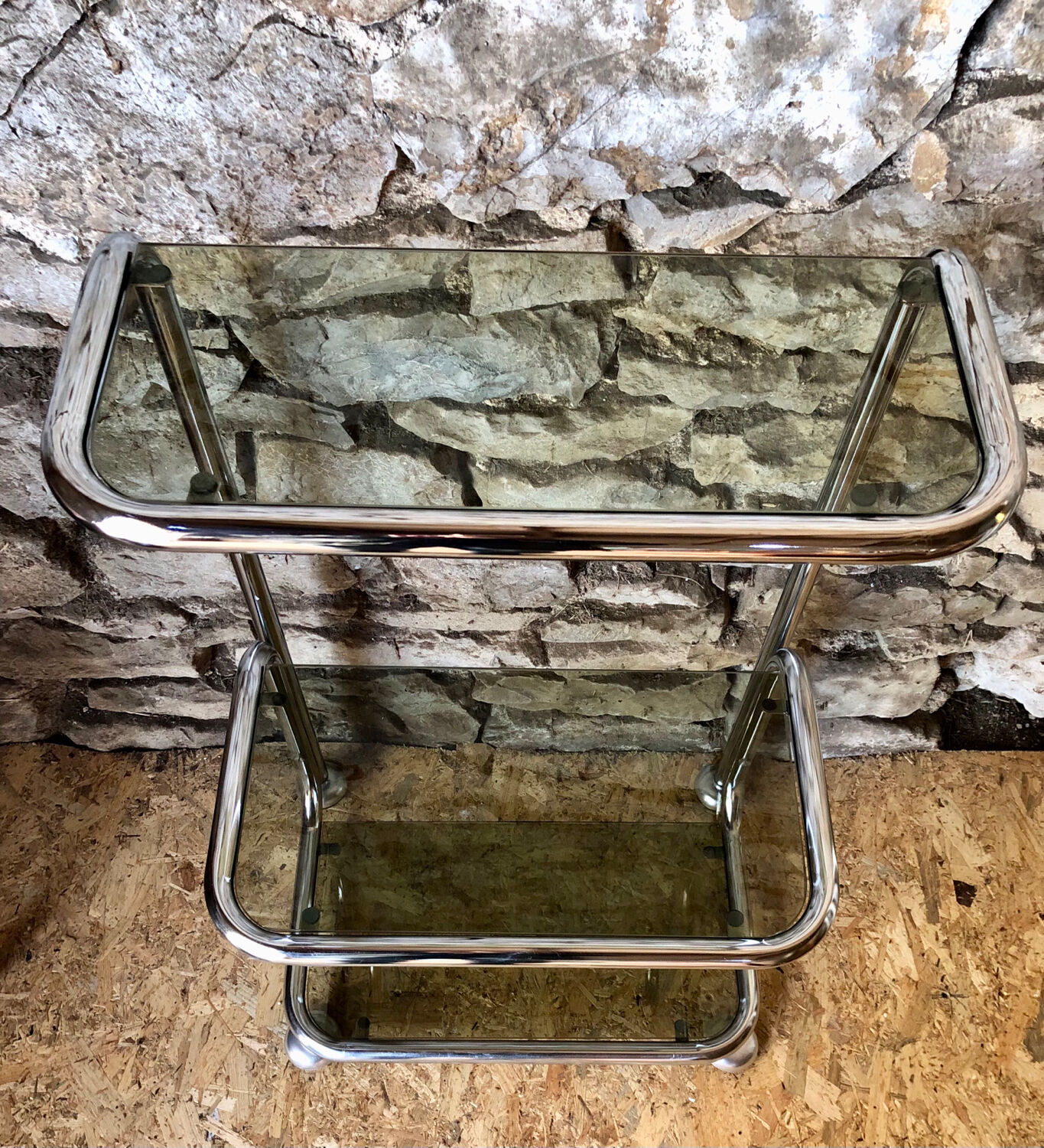 Chromed metal shelf and smoked glass