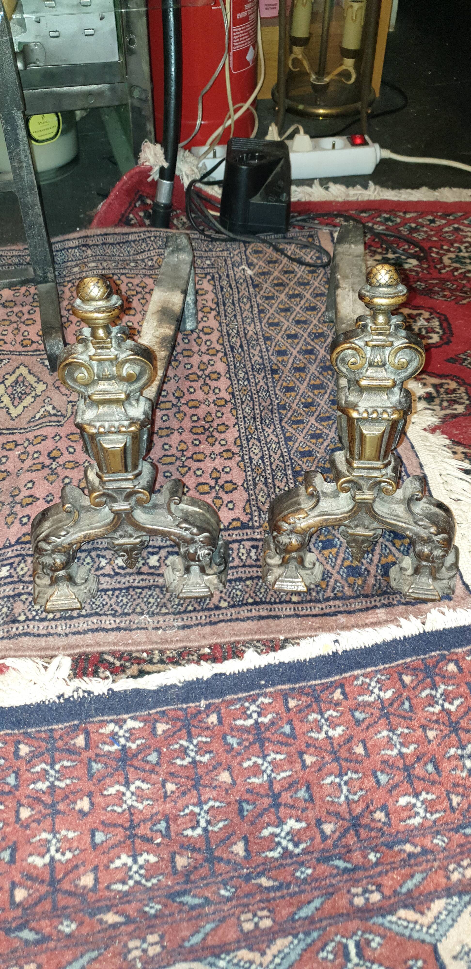Pair of cast iron and bronze chenets