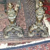 Pair of cast iron and bronze chenets
