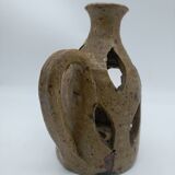 Stoneware candle holder.