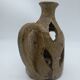 Stoneware candle holder.