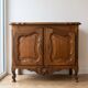 Small antique buffet in carved wood, Traditional style.