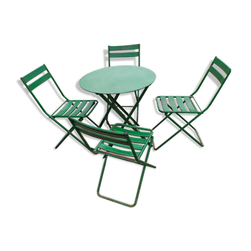 Garden set with folding metal table and chairs.