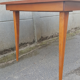 Dining table, formica, wooden feet, 50