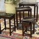 Set of 4 Chinese nesting tables in teak from the 1980s.