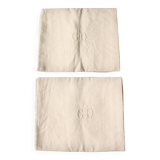 A set of 2 white linen napkins with GD monograms