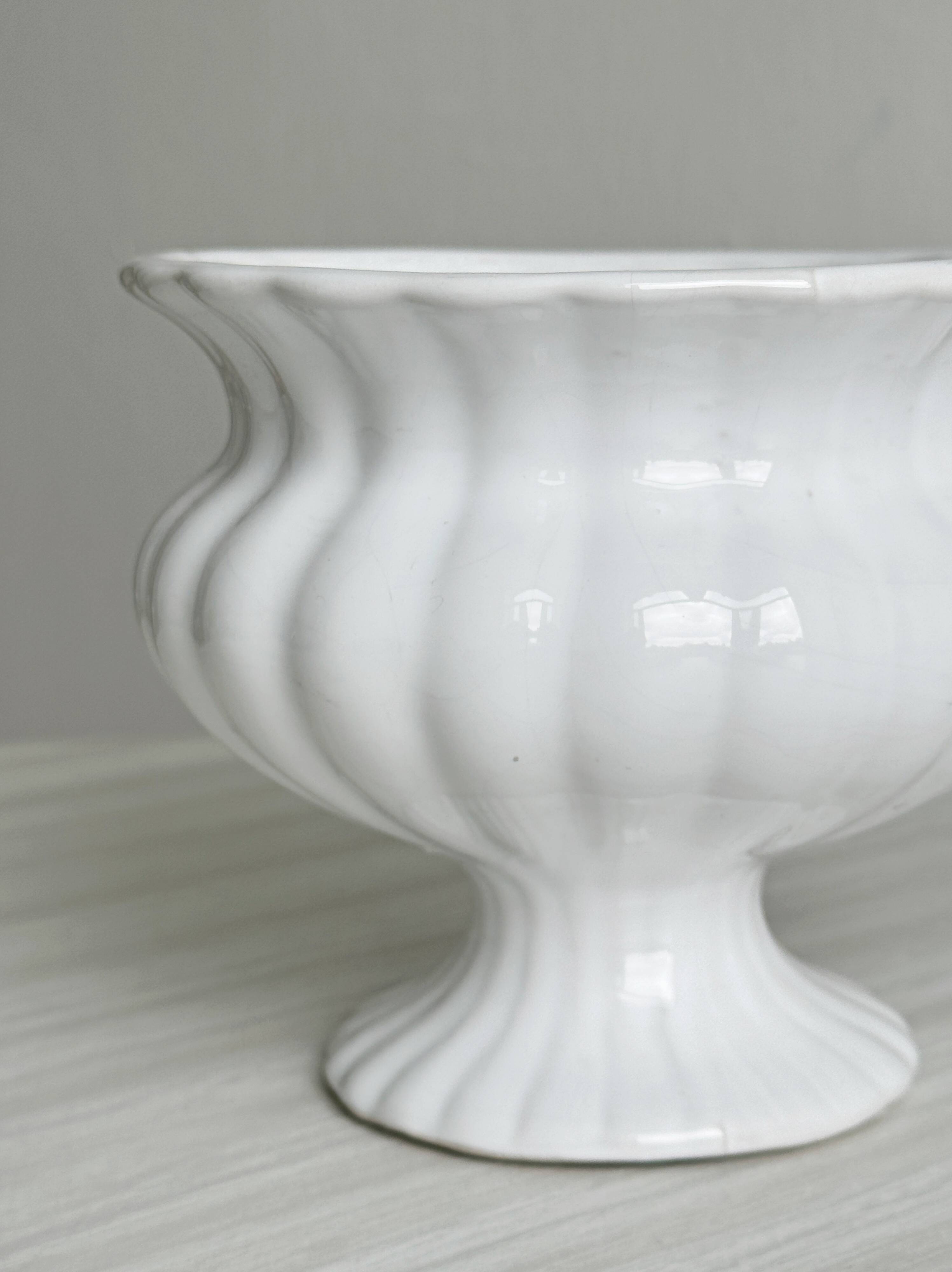 White ribbed porcelain plant pot cover