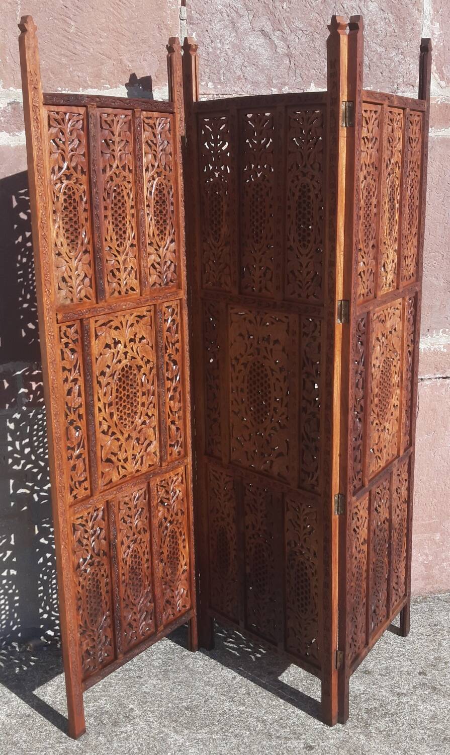 Carved solid wood screen.