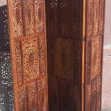 Carved solid wood screen.