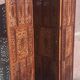 Carved solid wood screen.