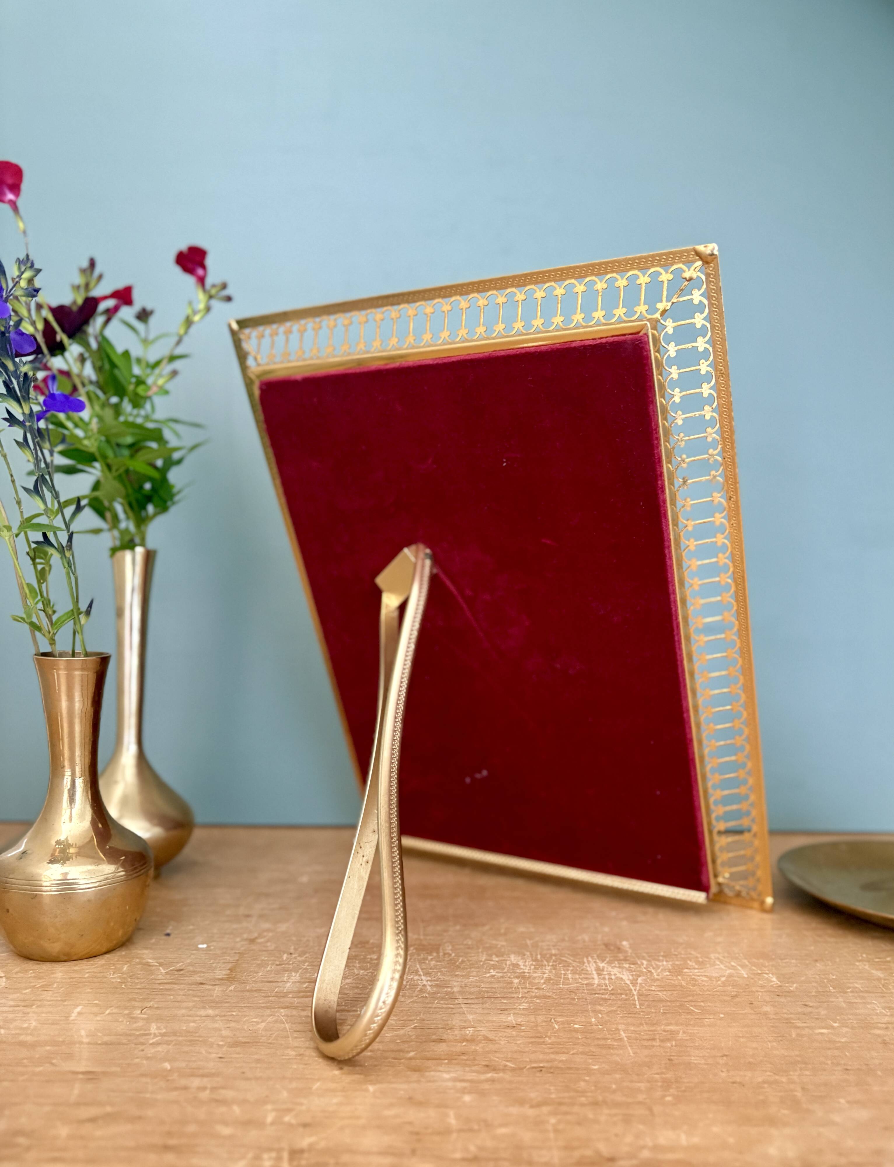 Antique gilt metal frame with flower engraving
