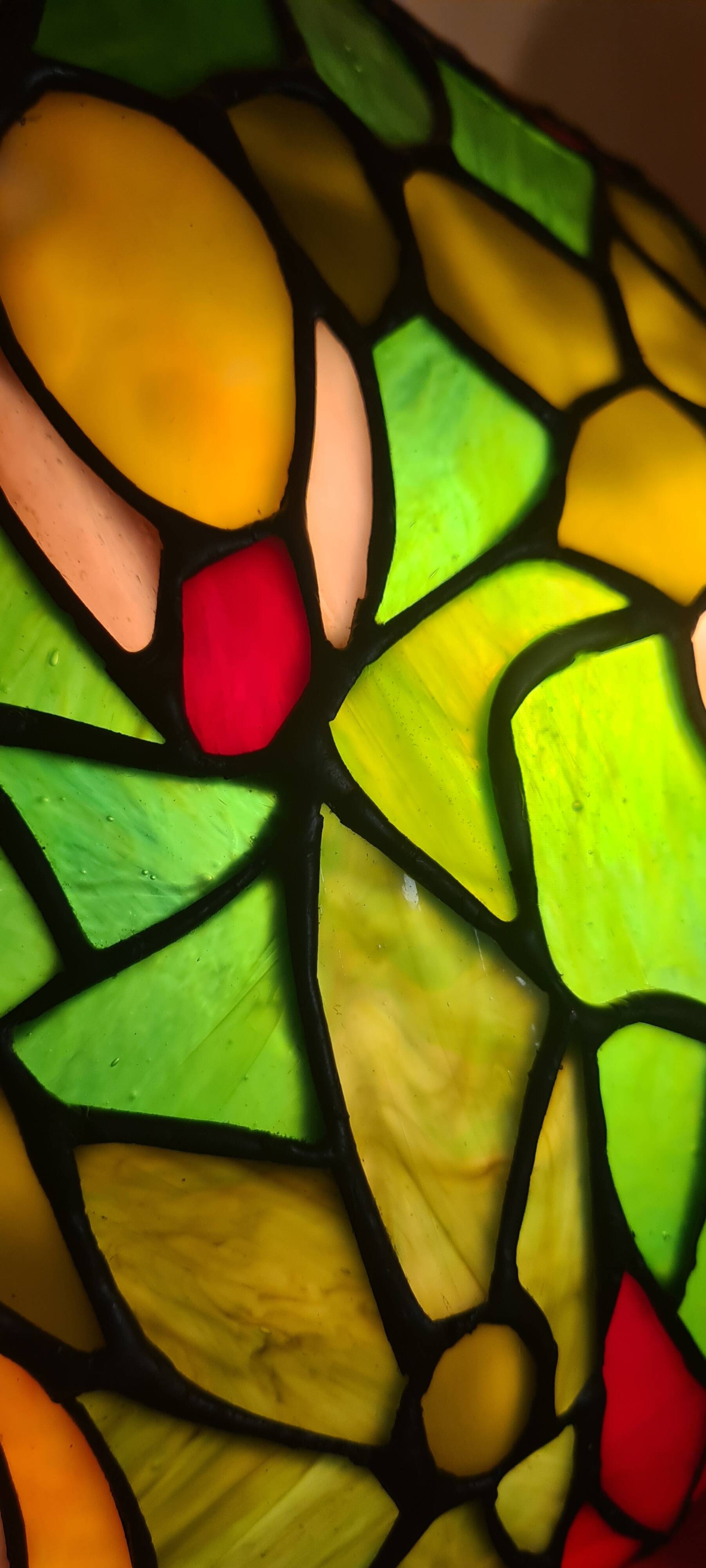 Antique bronze lamp and Tiffany-style stained glass shade. 46x32