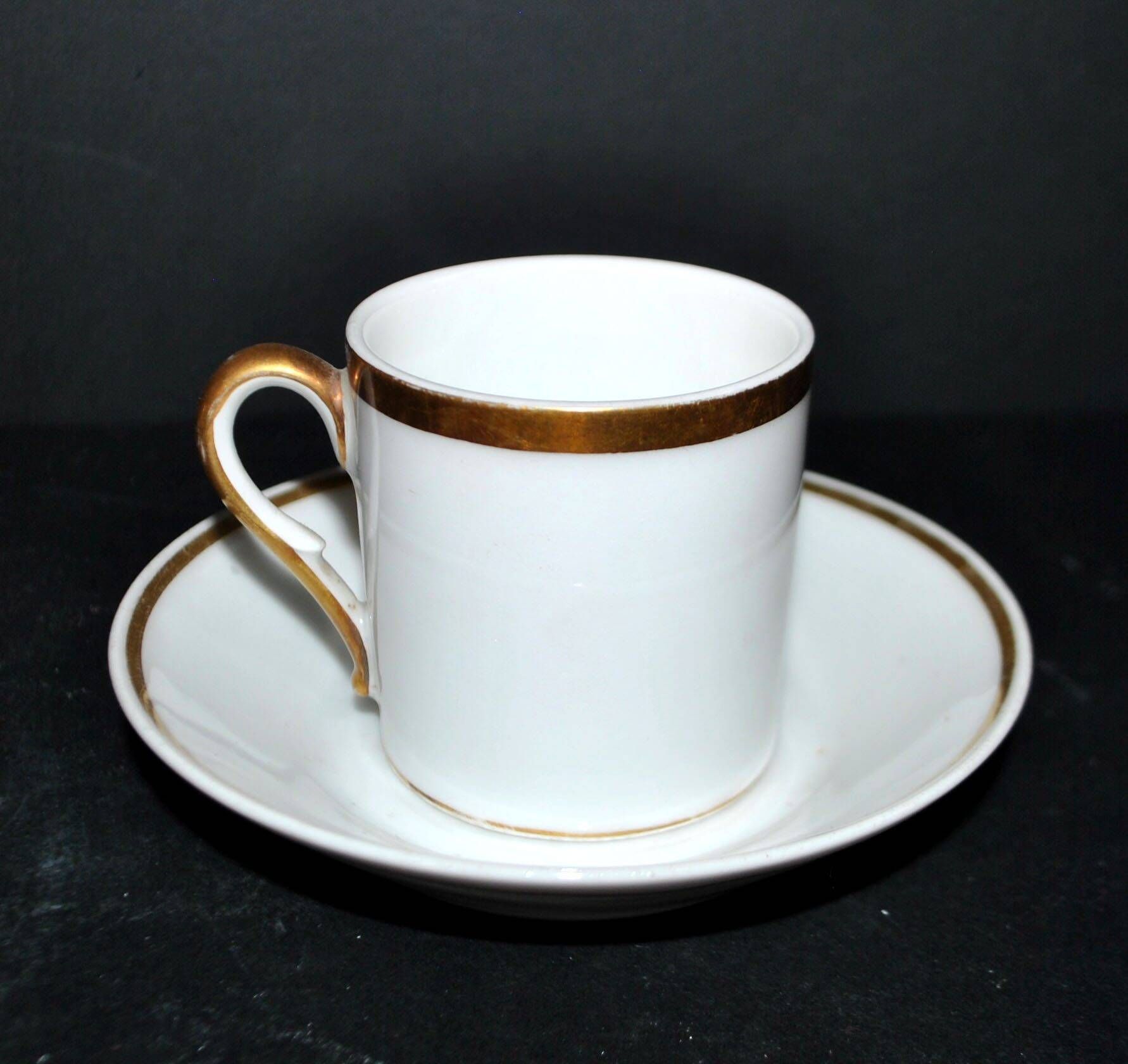 Charles Hebert Rouen porcelain – Antique litron coffee cup with gold trim.