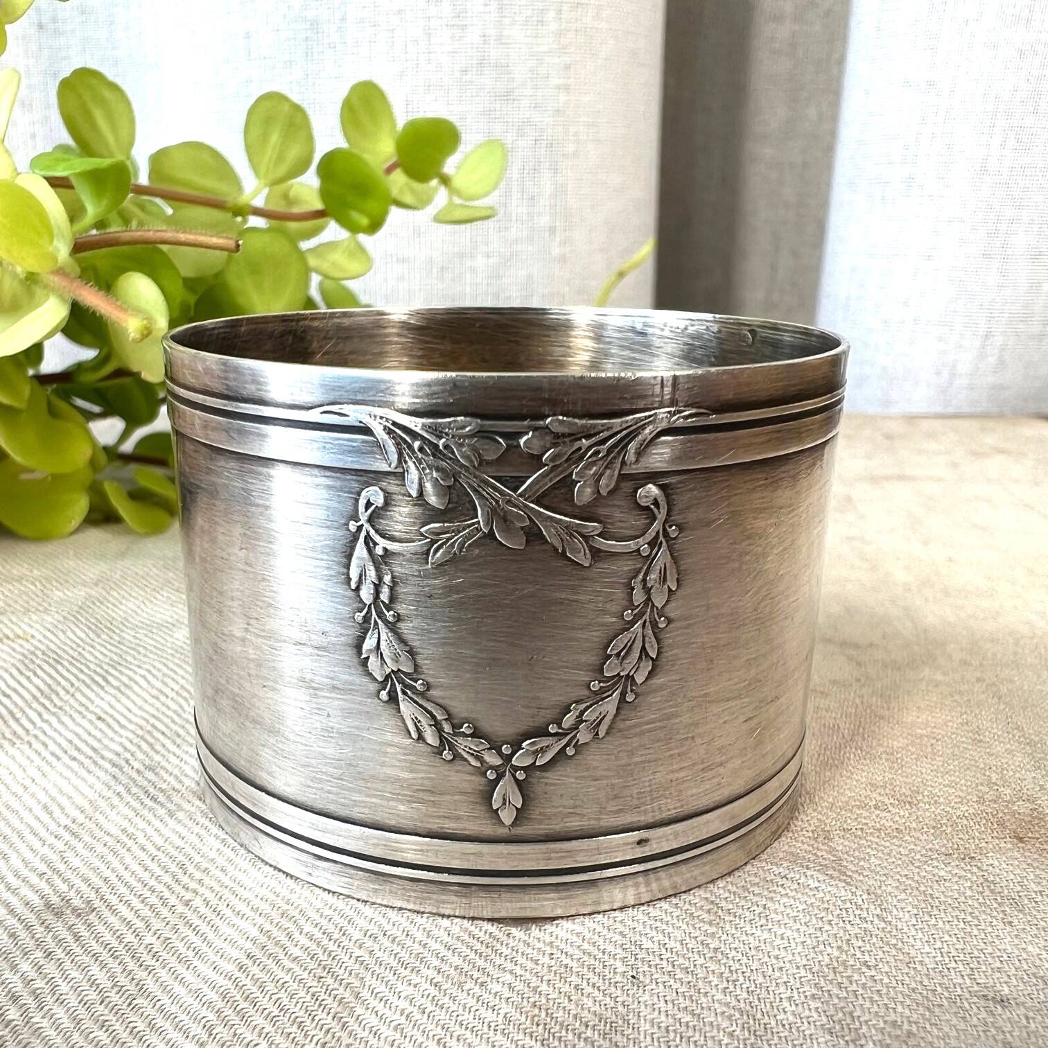 White metal napkin ring