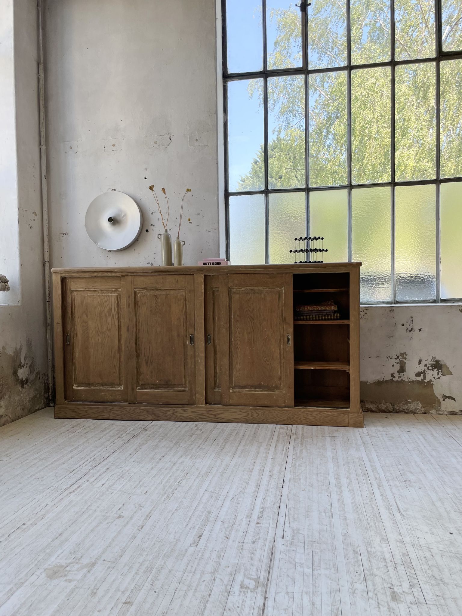 Large row of solid oak loom sliding doors