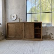 Large row of solid oak loom sliding doors