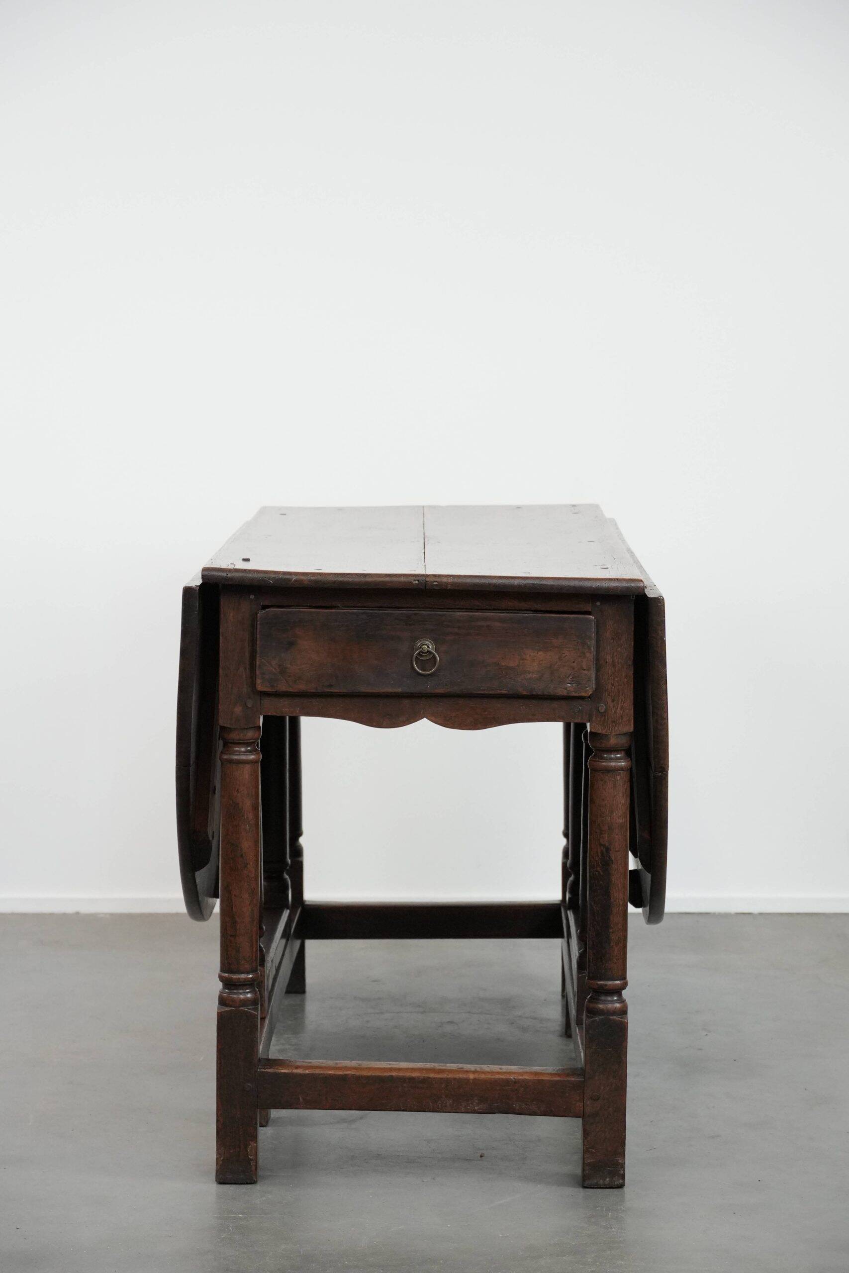 Antique English oak side/dining/gateleg table from the 18th century