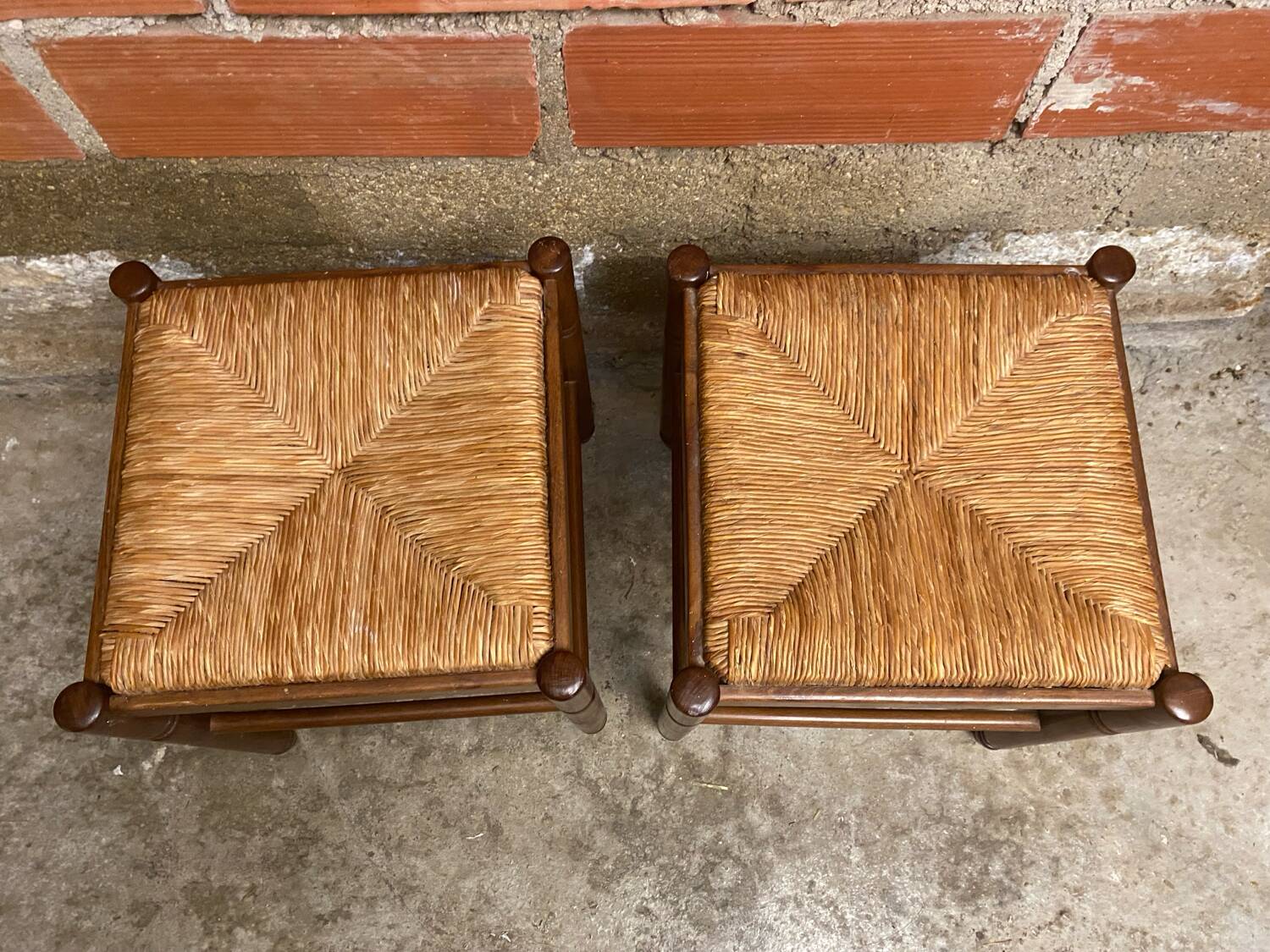 Pair of vintage wooden stools with woven straw seats