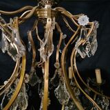 House Lucien Gau's gilded bronze and crystal chandelier
