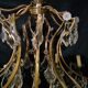 House Lucien Gau's gilded bronze and crystal chandelier
