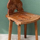 Old Swiss escabelle chair in carved wood