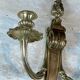 Pair of Louis XVI style bronze wall sconces