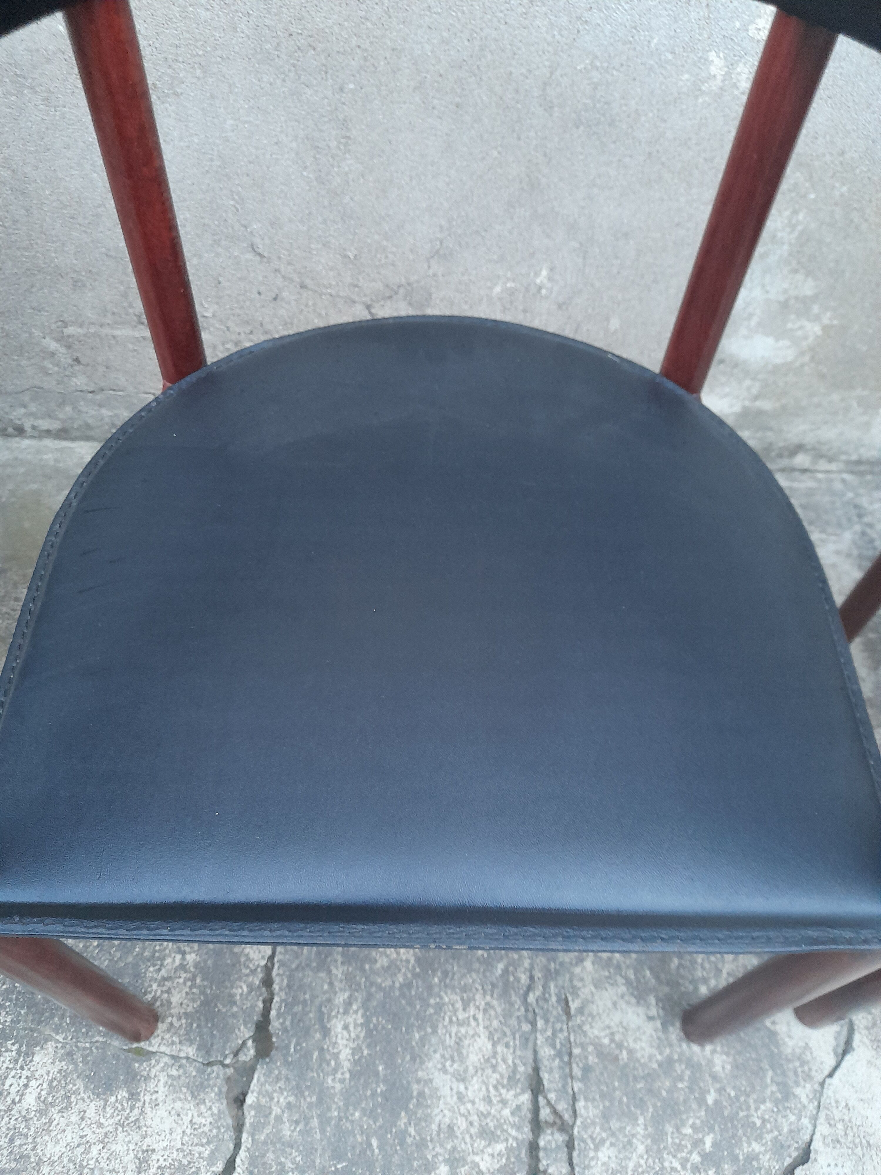 Pair of Scandinavian armchairs in teak and leather