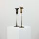 Pair of vintage brass candle holders with tulip decoration.