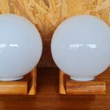 Pair of pine and opaline wall lamps