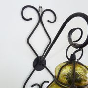 Italian vintage wall lamp in yellow blown glass and wrought iron. Year 70 80
