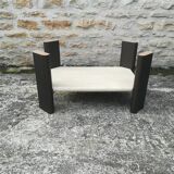 Low table in travertine and aluminium