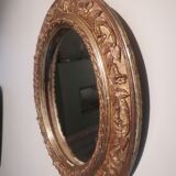 Miroir ovale art nouveau en stuc doré, 50x42 cm