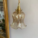 Baladeuse avec globe vintage en verre ambré