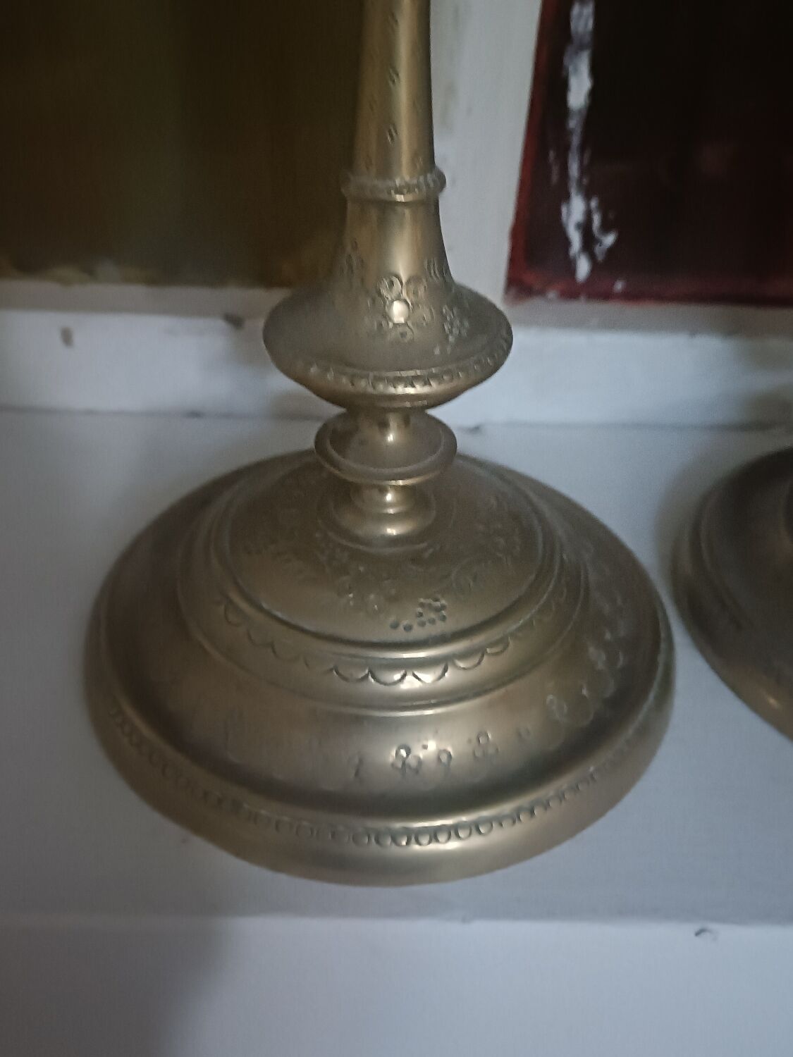 Pair of chiselled candlesticks