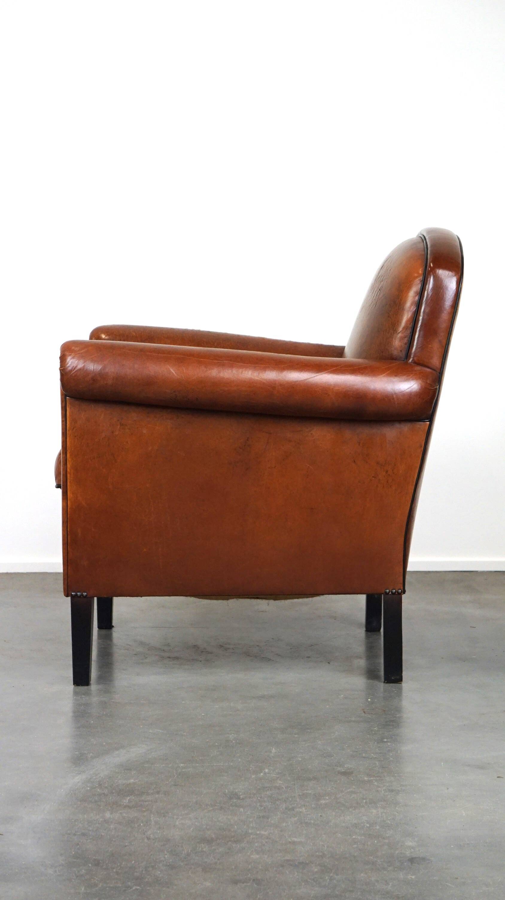 Vintage sheep leather armchair/design armchair with a beautiful look
