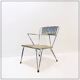 Vintage perforated metal armchair from the 1950s.