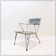 Vintage perforated metal armchair from the 1950s.