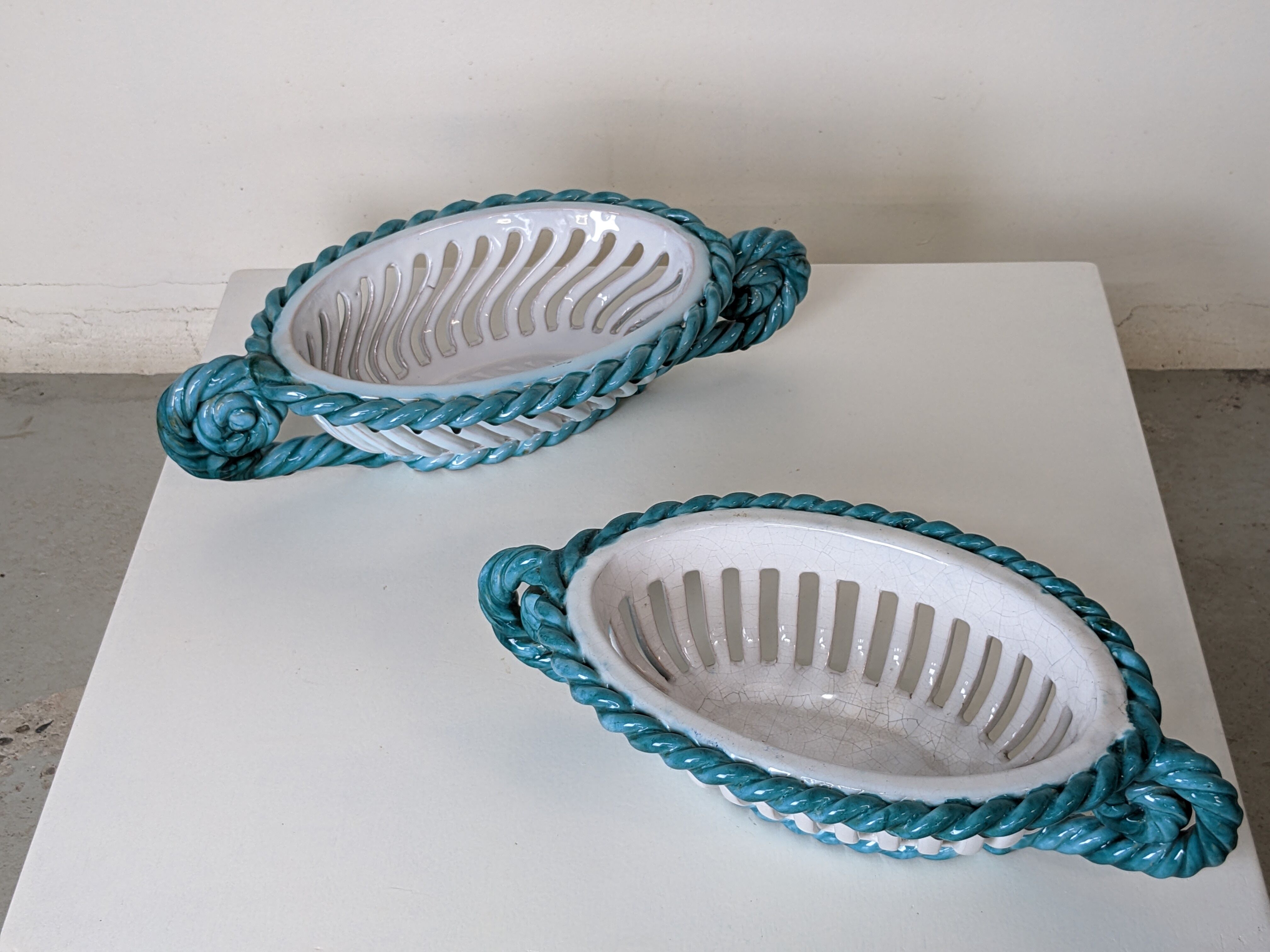 Set of 2 twisted earthenware fruit baskets by Sainte Radegonde, 50s