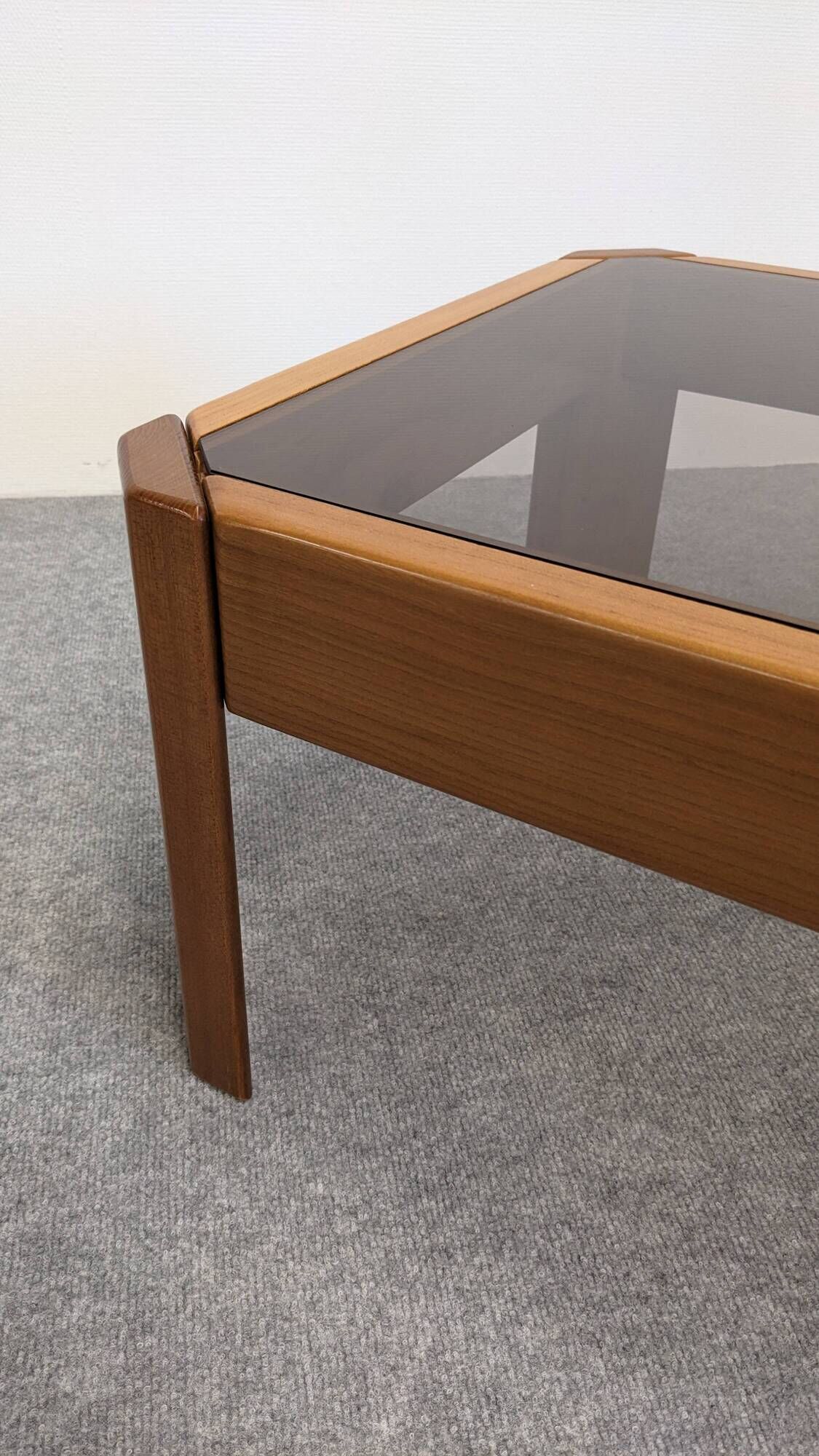 Modernist coffee table in elm and smoked glass, Italy circa 1970.