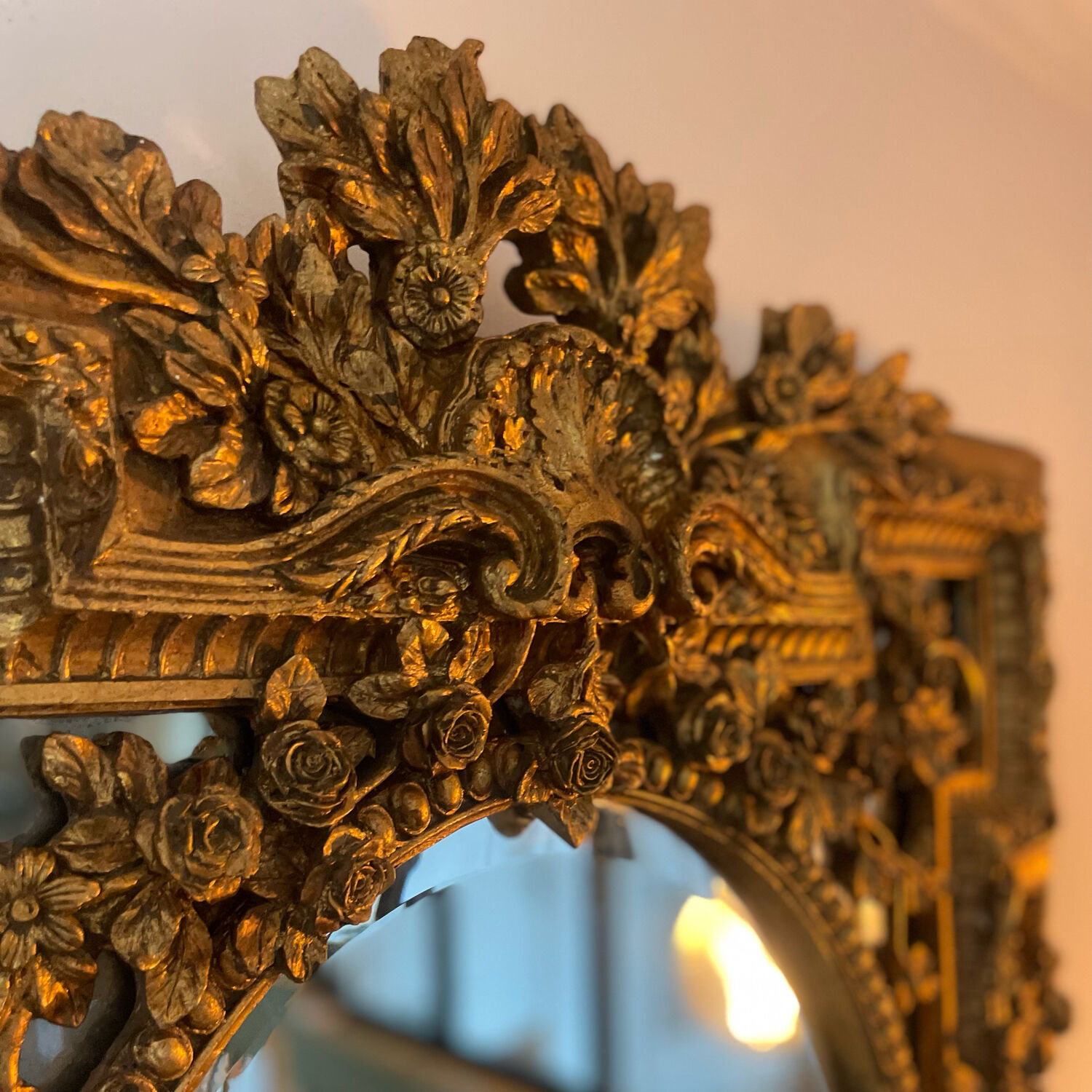 Antique mirror with gold leaf parecloses