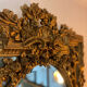 Antique mirror with gold leaf parecloses