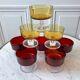 Set of 8 champagne glasses in amber colored glass and garnet 70s