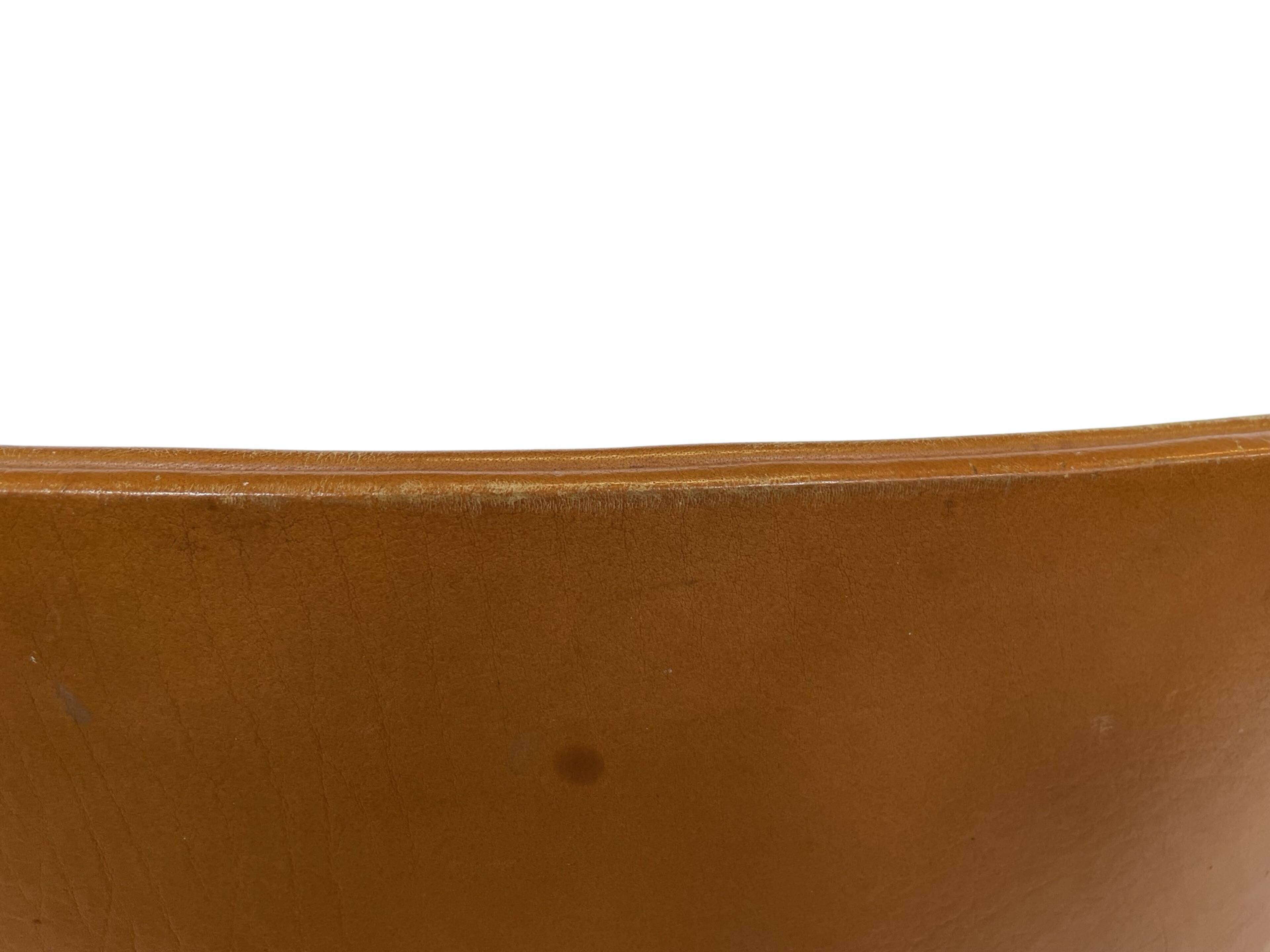 vintage dining room chair in cognac leather and chrome 1970s Italy