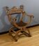 Dagobert armchair in walnut, Medieval style – Late 19th century
