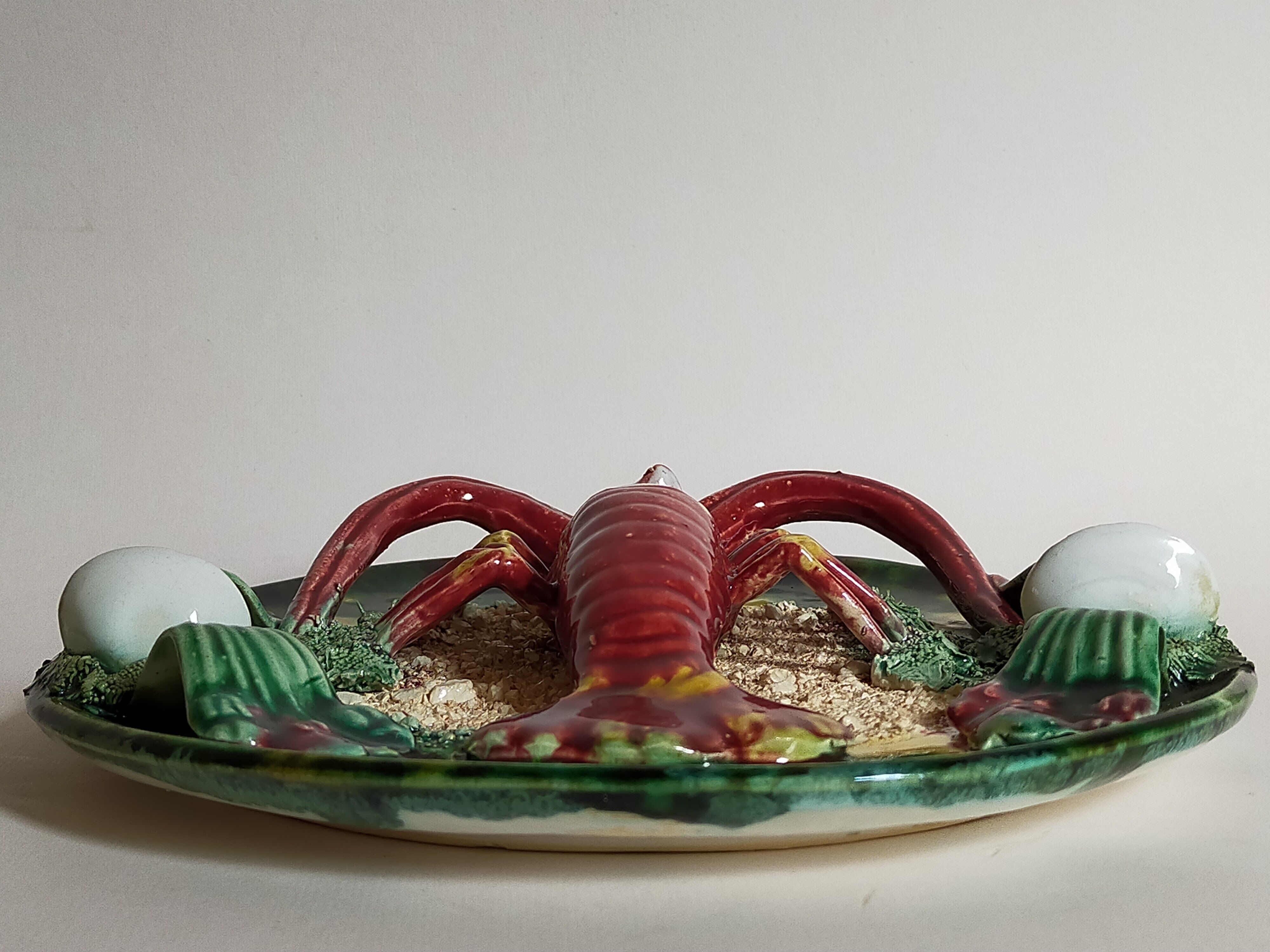 Plate in old barbotine with lobster